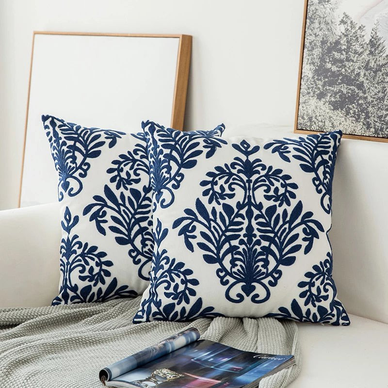 Damask design pair on a sofa