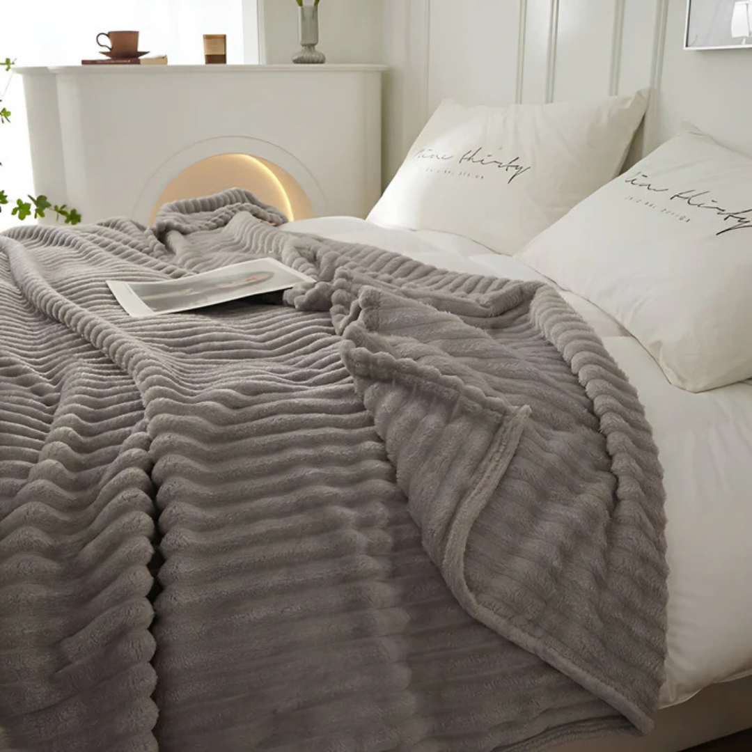 Grey throw in a bright room