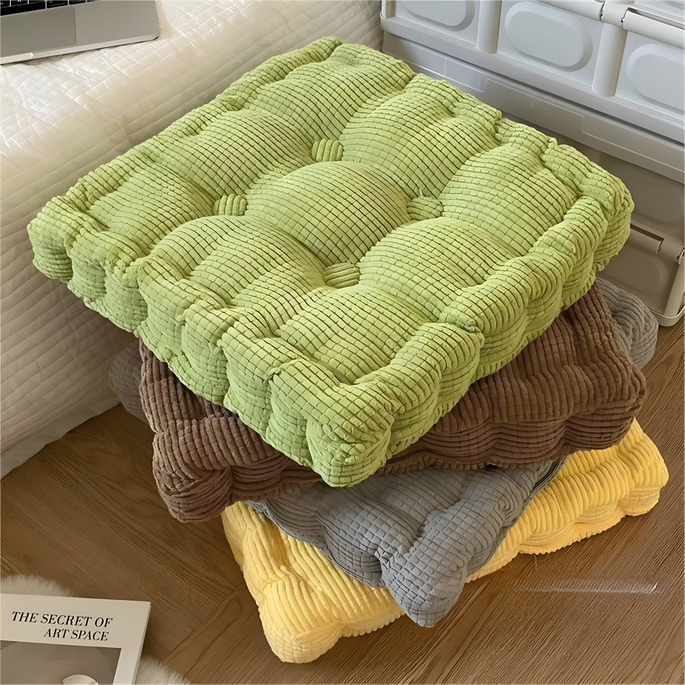 Stacked on a wooden floor