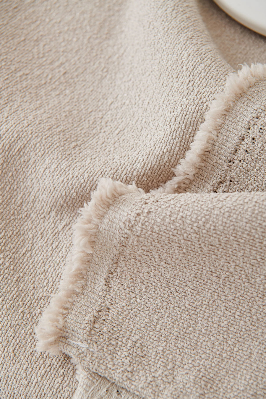 Frayed edges on all sides