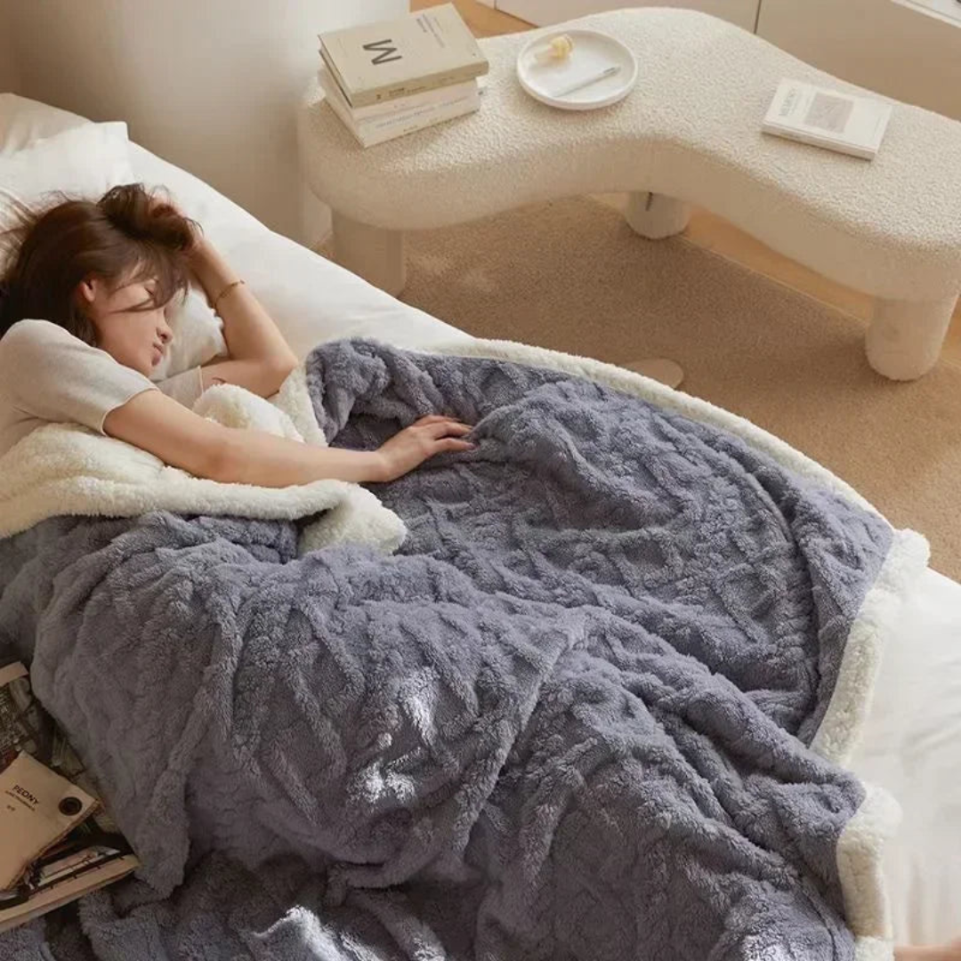 Blue blanket in a bedroom